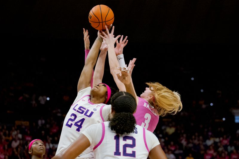 Feb 11, 2024; Baton Rouge, Louisiana, USA; LSU Lady Tigers guard Aneesah Morrow (24) grabs a rebound against Alabama Crimson Tide guard Sarah Ashlee Barker (3) during the second half at Pete Maravich Assembly Center. Mandatory Credit: Matthew Hinton-USA TODAY Sports