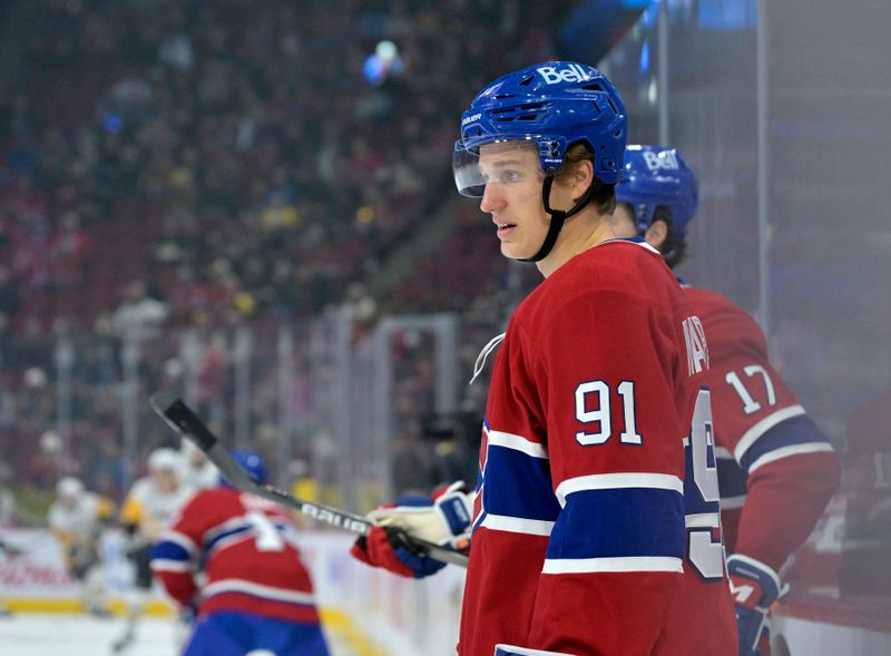 Oct 14, 2024; Montreal, Quebec, CAN; Montreal Canadiens forward Oliver Kapanen (91) stretches during the warmup period before the game against the Pittsburgh Penguins at the Bell Centre. Mandatory Credit: Eric Bolte-Imagn Images