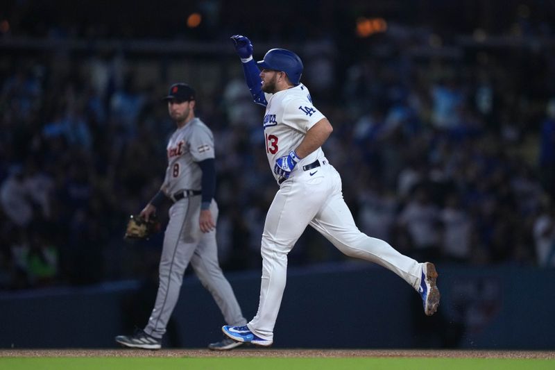 Sep 20, 2023; Los Angeles, California, USA; Los Angeles Dodgers third baseman Max Muncy (13) runs the bases after hitting a home run in the sixth inning against the Detroit Tigers at Dodger Stadium. Mandatory Credit: Kirby Lee-USA TODAY Sports