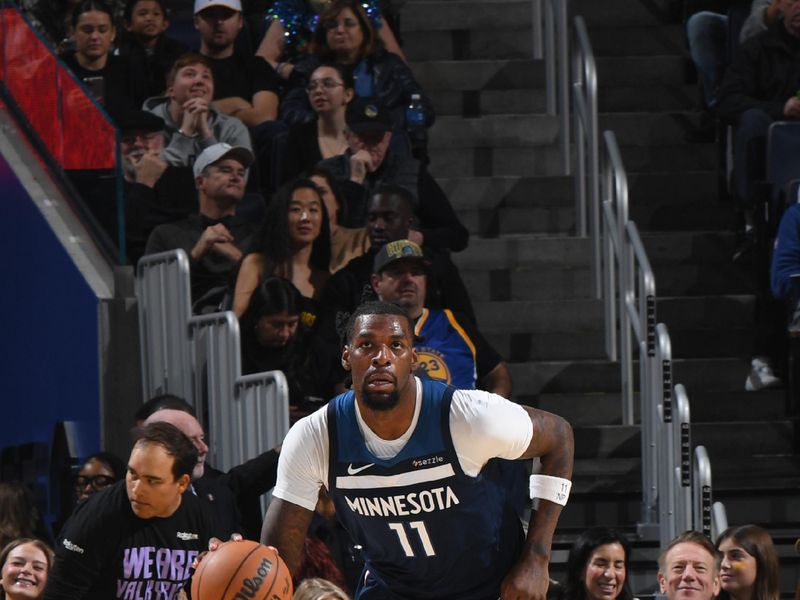 SAN FRANCISCO, CA - DECEMBER 8:  Naz Reid #11 of the Minnesota Timberwolves dribbles the ball during the game against the Golden State Warriors during a regular season game on December 8, 2024 at Chase Center in San Francisco, California. NOTE TO USER: User expressly acknowledges and agrees that, by downloading and or using this photograph, user is consenting to the terms and conditions of Getty Images License Agreement. Mandatory Copyright Notice: Copyright 2024 NBAE (Photo by Noah Graham/NBAE via Getty Images)