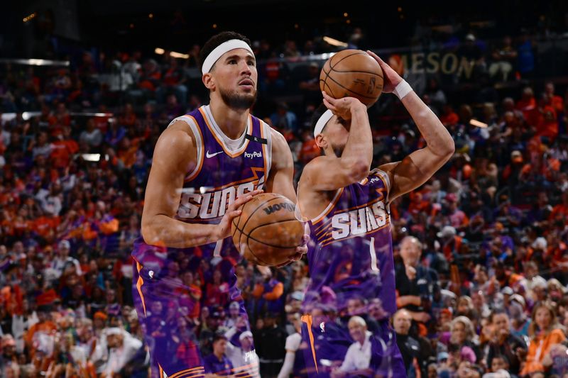 PHOENIX, AZ - OCTOBER  26: Devin Booker #1 of the Phoenix Suns shoots a free throw during the game against the Dallas Mavericks on October 26, 2024 at Footprint Center in Phoenix, Arizona. NOTE TO USER: User expressly acknowledges and agrees that, by downloading and or using this photograph, user is consenting to the terms and conditions of the Getty Images License Agreement. Mandatory Copyright Notice: Copyright 2024 NBAE (Photo by Kate Frese/NBAE via Getty Images)