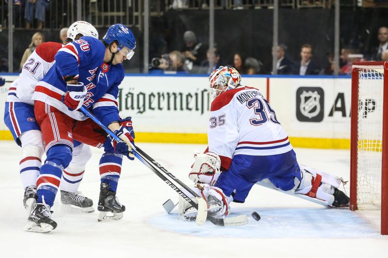 Feb 15, 2024; New York, New York, USA; New York Rangers left wing Will Cuylle (50) pushes the puck past Montreal Canadiens goaltender Sam Montembeault (35) for a goal in the second period at Madison Square Garden. Mandatory Credit: Wendell Cruz-USA TODAY Sports