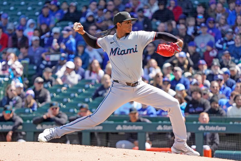 Apr 21, 2024; Chicago, Illinois, USA; Miami Marlins pitcher Edward Cabrera (27) throws the ball against the Chicago Cubs during the first inning at Wrigley Field. Mandatory Credit: David Banks-USA TODAY Sports