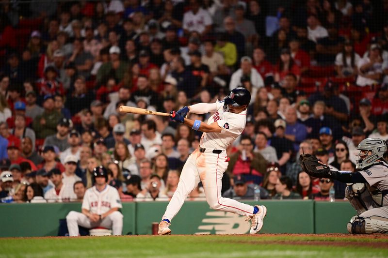 Jun 16, 2024; Boston, Massachusetts, USA; Boston Red Sox shortstop David Hamilton (70) hits a single against the New York Yankees during the fifth inning at Fenway Park. Mandatory Credit: Eric Canha-USA TODAY Sports