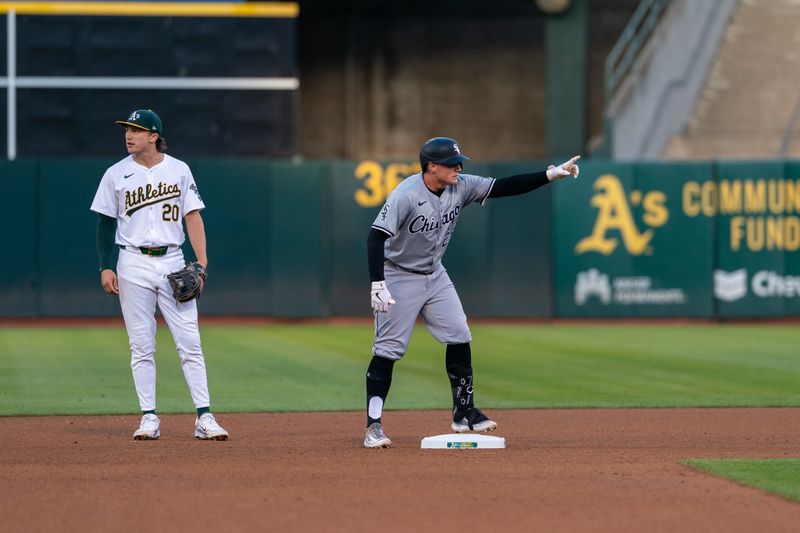 Aug 5, 2024; Oakland, California, USA;  Chicago White Sox first baseman Andrew Vaughn (25) celebrates after hitting a double against the Oakland Athletics during the fourth inning at Oakland-Alameda County Coliseum. Mandatory Credit: Neville E. Guard-USA TODAY Sports