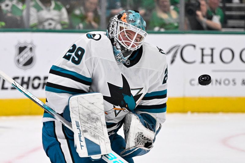 Oct 15, 2024; Dallas, Texas, USA; San Jose Sharks goaltender Mackenzie Blackwood (29) stops a shot by the Dallas Stars during the second period at the American Airlines Center. Mandatory Credit: Jerome Miron-Imagn Images