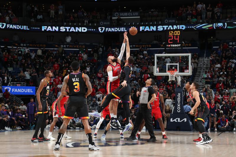 NEW ORLEANS, LA - APRIL 1:  Jonas Valanciunas #17 of the New Orleans Pelicans goes for the tipoff against Jusuf Nurkic #20 of the Phoenix Suns on April 1, 2024 at the Smoothie King Center in New Orleans, Louisiana. NOTE TO USER: User expressly acknowledges and agrees that, by downloading and or using this Photograph, user is consenting to the terms and conditions of the Getty Images License Agreement. Mandatory Copyright Notice: Copyright 2024 NBAE (Photo by Layne Murdoch Jr./NBAE via Getty Images)