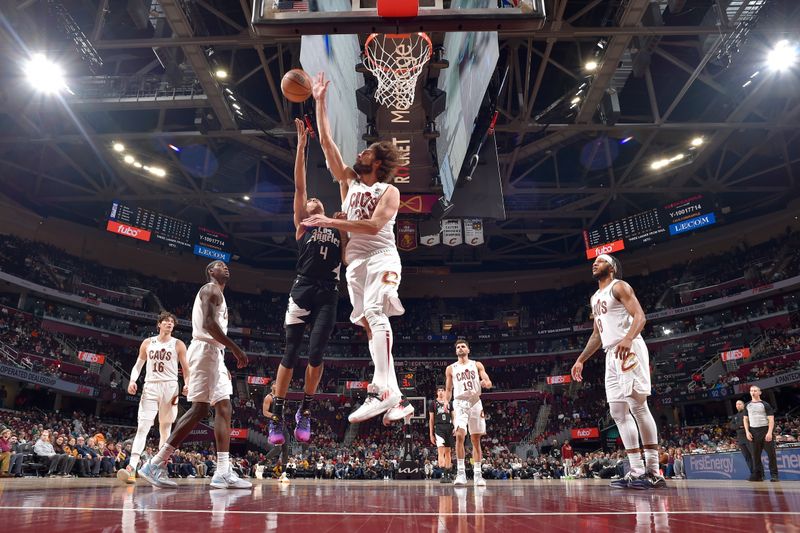 CLEVELAND, OH - JANUARY 29: Robin Lopez #33 of the Cleveland Cavaliers blocks the shot of Brandon Boston Jr. #4 of the LA Clippers during the game  on January 29, 2023 at Rocket Mortgage FieldHouse in Cleveland, Ohio. NOTE TO USER: User expressly acknowledges and agrees that, by downloading and/or using this Photograph, user is consenting to the terms and conditions of the Getty Images License Agreement. Mandatory Copyright Notice: Copyright 2023 NBAE (Photo by David Liam Kyle/NBAE via Getty Images)