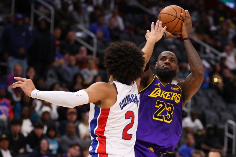 DETROIT, MICHIGAN - NOVEMBER 04: LeBron James #23 of the Los Angeles Lakers shoots the ball against Cade Cunningham #2 of the Detroit Pistons during the second quarter at Little Caesars Arena on November 04, 2024 in Detroit, Michigan. NOTE TO USER: User expressly acknowledges and agrees that, by downloading and/or using this photograph, user is consenting to the terms and conditions of the Getty Images License Agreement.  (Photo by Gregory Shamus/Getty Images)