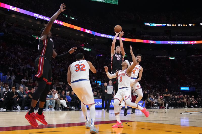 MIAMI, FL - MARCH 02:  Duncan Robinson #55 of the Miami Heat shoots the ball during the game against the New York Knicks on March 02, 2025 at Kaseya Center in Miami, Florida. NOTE TO USER: User expressly acknowledges and agrees that, by downloading and or using this Photograph, user is consenting to the terms and conditions of the Getty Images License Agreement. Mandatory Copyright Notice: Copyright 2025 NBAE (Photo by Eric Espada/NBAE via Getty Images)