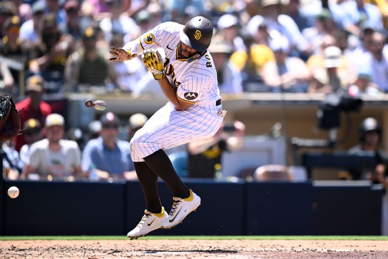 Jul 26, 2023; San Diego, California, USA; San Diego Padres shortstop Xander Bogaerts (2) is hit by a pitch during the third inning against the Pittsburgh Pirates at Petco Park. Mandatory Credit: Orlando Ramirez-USA TODAY Sports