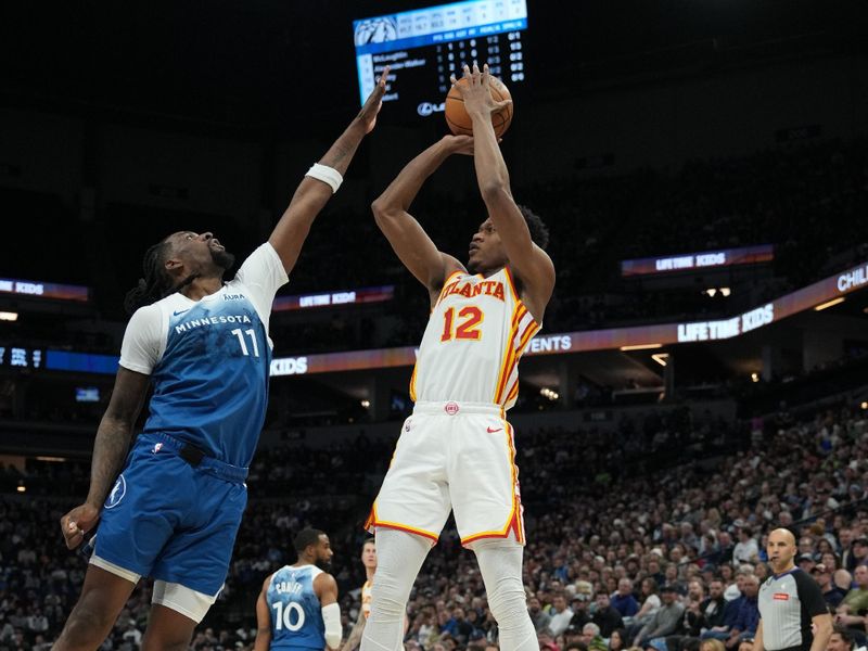 MINNEAPOLIS, MN -  APRIL 12: De'Andre Hunter #12 of the Atlanta Hawks shoots the ball during the game against the Minnesota Timberwolves on April 12, 2024 at Target Center in Minneapolis, Minnesota. NOTE TO USER: User expressly acknowledges and agrees that, by downloading and or using this Photograph, user is consenting to the terms and conditions of the Getty Images License Agreement. Mandatory Copyright Notice: Copyright 2024 NBAE (Photo by Jordan Johnson/NBAE via Getty Images)