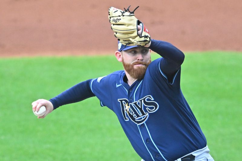 Sep 2, 2023; Cleveland, Ohio, USA; Tampa Bay Rays starting pitcher Zack Little (52) delivers against the Cleveland Guardians in the first inning at Progressive Field. Mandatory Credit: David Richard-USA TODAY Sports