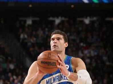 MILWAUKEE, WI - DECEMBER 2: Brook Lopez #11 of the Milwaukee Bucks shoots a free throw during the game against the Atlanta Hawks on December 2, 2023 at the Fiserv Forum Center in Milwaukee, Wisconsin. NOTE TO USER: User expressly acknowledges and agrees that, by downloading and or using this Photograph, user is consenting to the terms and conditions of the Getty Images License Agreement. Mandatory Copyright Notice: Copyright 2023 NBAE (Photo by Gary Dineen/NBAE via Getty Images).