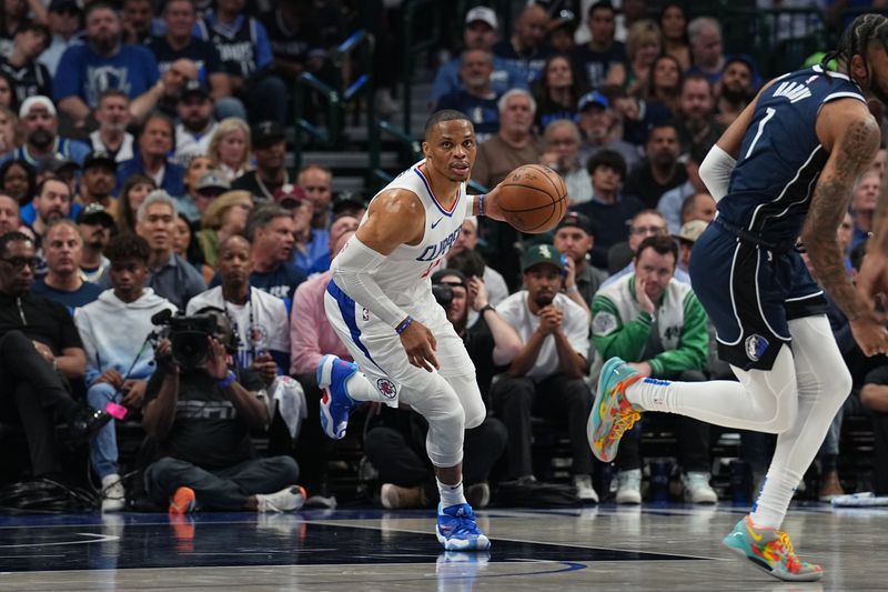 DALLAS, TX - APRIL 28: Russell Westbrook #0 of the LA Clippers handles the ball during the game against the Dallas Mavericks during Round 1 Game 4 of the 2024NBA Playoffs on April 28, 2024 at the American Airlines Center in Dallas, Texas. NOTE TO USER: User expressly acknowledges and agrees that, by downloading and or using this photograph, User is consenting to the terms and conditions of the Getty Images License Agreement. Mandatory Copyright Notice: Copyright 2024 NBAE (Photo by Glenn James/NBAE via Getty Images)