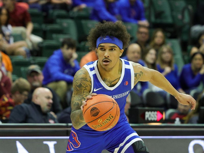Nov 23, 2023; Kissimmee, FL, USA;  Boise State Broncos guard Roddie Anderson III (0) controls the ball against the Virginia Tech Hokies in the first half during the ESPN Events Invitational at State Farm Field House. Mandatory Credit: Nathan Ray Seebeck-USA TODAY Sports