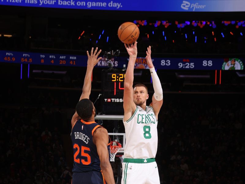 NEW YORK, NY - APRIL 8:  Kristaps Porzingis #8 of the Boston Celtics shoots the ball during the game against the New York Knicks on April 8, 2025 at Madison Square Garden in New York City, New York.  NOTE TO USER: User expressly acknowledges and agrees that, by downloading and or using this photograph, User is consenting to the terms and conditions of the Getty Images License Agreement. Mandatory Copyright Notice: Copyright 2025 NBAE  (Photo by Nathaniel S. Butler/NBAE via Getty Images)