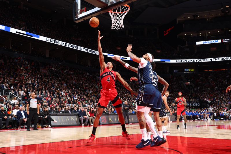 TORONTO, CANADA - FEBRUARY 28: Scottie Barnes #4 of the Toronto Raptors drives to the basket during the game against the Dallas Mavericks on February 28, 2024 at the Scotiabank Arena in Toronto, Ontario, Canada.  NOTE TO USER: User expressly acknowledges and agrees that, by downloading and or using this Photograph, user is consenting to the terms and conditions of the Getty Images License Agreement.  Mandatory Copyright Notice: Copyright 2024 NBAE (Photo by Vaughn Ridley/NBAE via Getty Images)