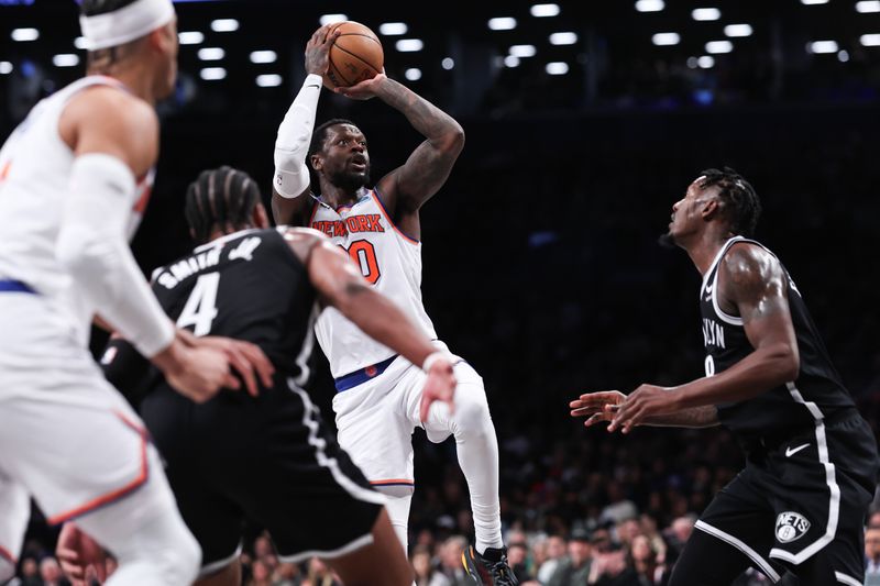 NEW YORK, NEW YORK - JANUARY 23: Julius Randle #30 of the New York Knicks shoots the ball during the third quarter of the game against the Brooklyn Nets at Barclays Center on January 23, 2024 in New York City.  NOTE TO USER: User expressly acknowledges and agrees that, by downloading and or using this photograph, User is consenting to the terms and conditions of the Getty Images License Agreement. (Photo by Dustin Satloff/Getty Images)