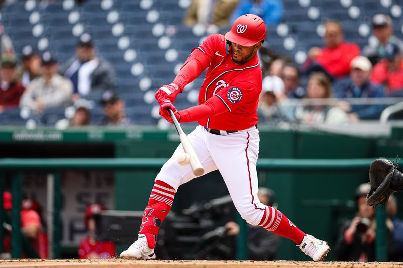 Mar 28, 2023; Washington, District of Columbia, USA; Washington Nationals second baseman Luis Garcia (2) doubles against the New York Yankees during the second inning of the Spring Training game at Nationals Park. Mandatory Credit: Scott Taetsch-USA TODAY Sports