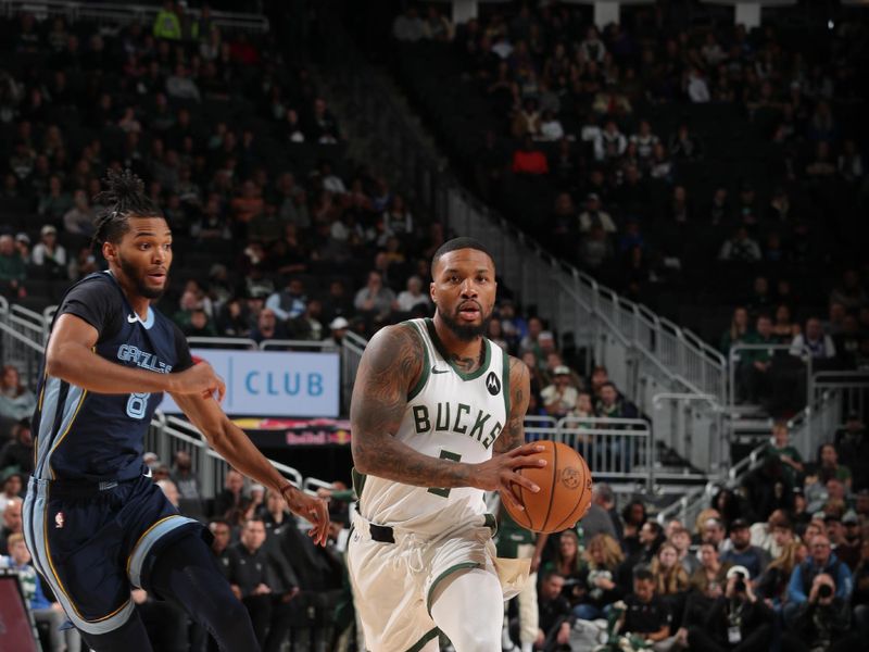 MILWAUKEE, WI - OCTOBER 20: Damian Lillard #0 of the Milwaukee Bucks drives to the basket during the preseason game on October 20, 2023 at the Fiserv Forum Center in Milwaukee, Wisconsin. NOTE TO USER: User expressly acknowledges and agrees that, by downloading and or using this Photograph, user is consenting to the terms and conditions of the Getty Images License Agreement. Mandatory Copyright Notice: Copyright 2023 NBAE (Photo by Gary Dineen/NBAE via Getty Images).