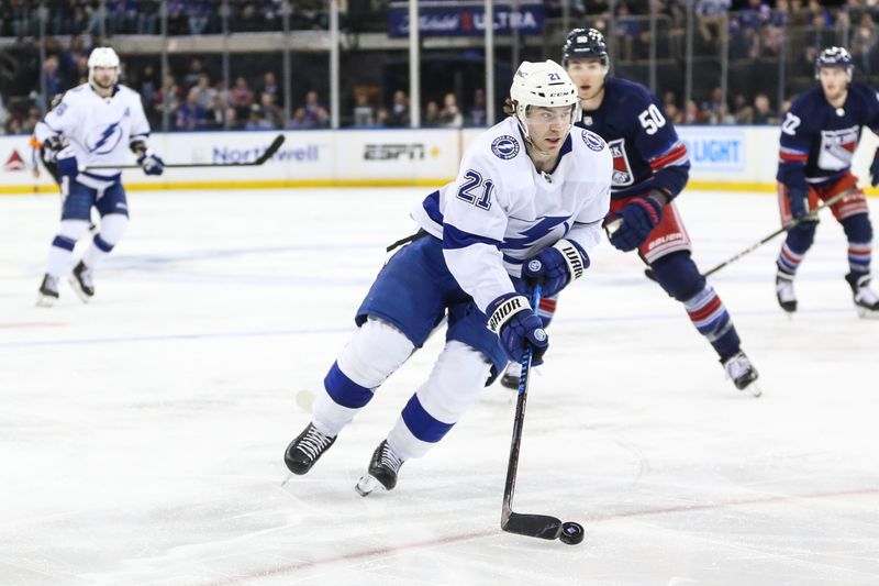 Feb 7, 2024; New York, New York, USA; Tampa Bay Lightning center Brayden Point (21) controls the puck in the third period against the New York Rangers at Madison Square Garden. Mandatory Credit: Wendell Cruz-USA TODAY Sports