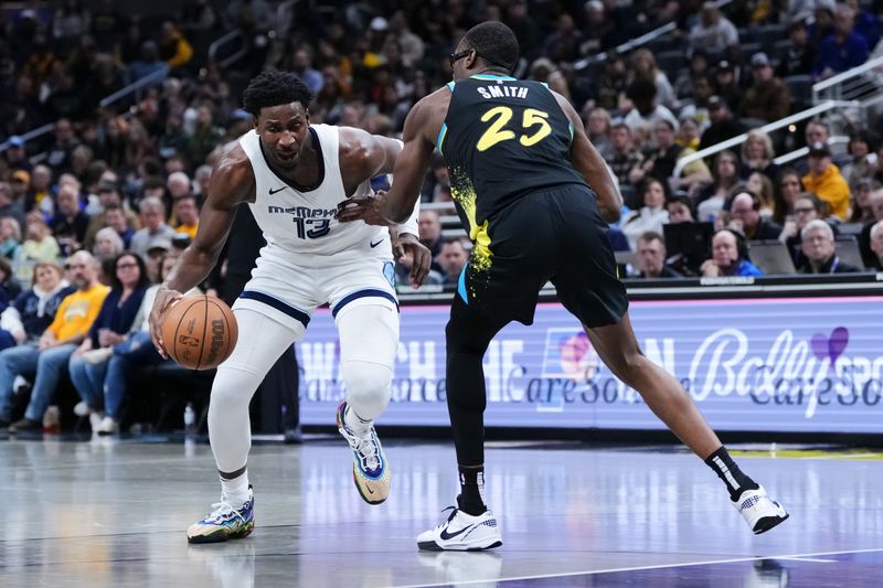 INDIANAPOLIS, INDIANA - JANUARY 28: Jaren Jackson Jr. #13 of the Memphis Grizzlies dribbles the ball while being guarded by Jalen Smith #25 of the Indiana Pacers in the third quarter at Gainbridge Fieldhouse on January 28, 2024 in Indianapolis, Indiana. NOTE TO USER: User expressly acknowledges and agrees that, by downloading and or using this photograph, User is consenting to the terms and conditions of the Getty Images License Agreement. (Photo by Dylan Buell/Getty Images)