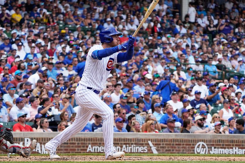 Jul 15, 2023; Chicago, Illinois, USA; Chicago Cubs center fielder Cody Bellinger (24) hits a grand slam home run against the Boston Red Sox during the third inning at Wrigley Field. Mandatory Credit: David Banks-USA TODAY Sports