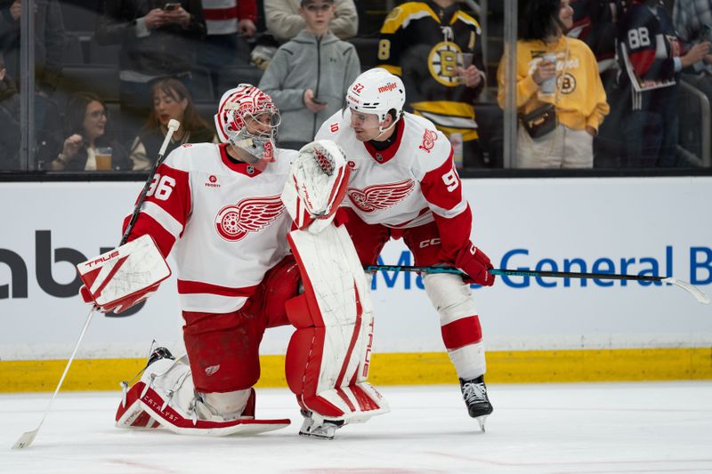 Jan 13, 2026; Boston, Massachusetts, USA; Detroit Red Wings goaltender John Gibson (36) and center Marco Kasper (92) chat during warm ups before a game against the Boston Bruins at TD Garden. Mandatory Credit: Natalie Reid-Imagn Images