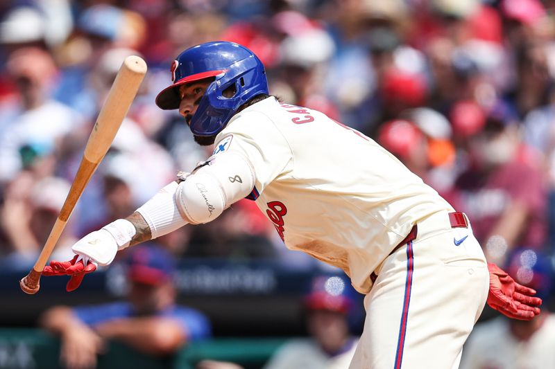 Jul 31, 2024; Philadelphia, Pennsylvania, USA;  Philadelphia Phillies outfielder Nick Castellanos (8) hits an RBI fielders choice during the sixth inning against the New York Yankees at Citizens Bank Park. Mandatory Credit: Bill Streicher-USA TODAY Sports