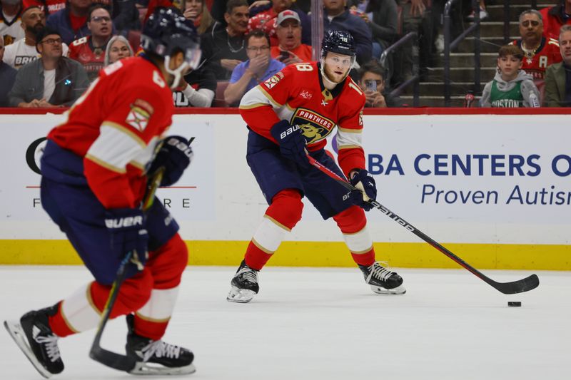 May 8, 2024; Sunrise, Florida, USA; Florida Panthers center Steven Lorentz (18) moves the puck against the Boston Bruins during the first period in game two of the second round of the 2024 Stanley Cup Playoffs at Amerant Bank Arena. Mandatory Credit: Sam Navarro-USA TODAY Sports
