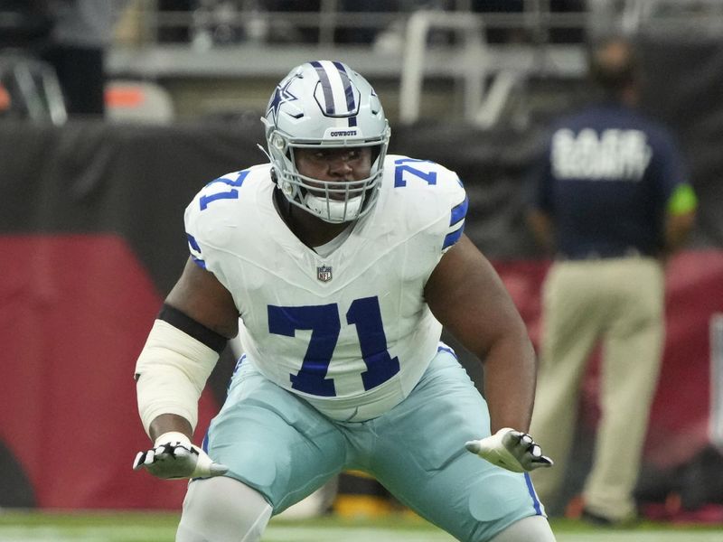 Dallas Cowboys guard Chuma Edoga (71) lines up against the Arizona Cardinals during the first half of an NFL football game, Sunday, Sept. 24, 2023, in Glendale, Ariz. (AP Photo/Rick Scuteri)