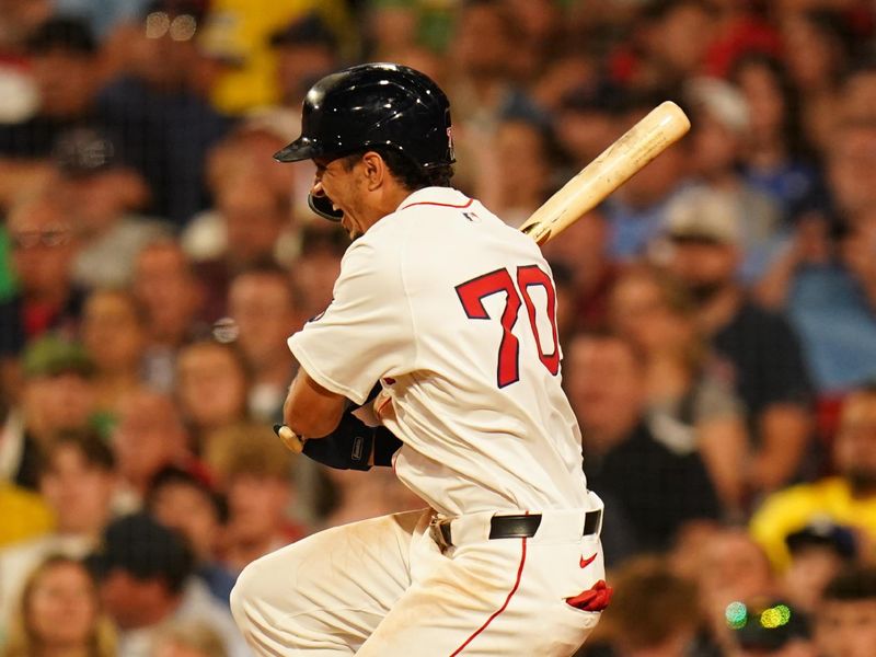 Jun 13, 2024; Boston, Massachusetts, USA; Boston Red Sox shortstop David Hamilton (70) is hit in the foot by the ball against the Philadelphia Phillies in the fifth inning at Fenway Park. Mandatory Credit: David Butler II-USA TODAY Sports