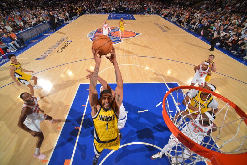 NEW YORK, NY - MAY 19: Obi Toppin #1 of the Indiana Pacers rebounds the ball during the game against the New York Knicks during Round 2 Game 7 of the 2024 NBA Playoffs on May 19, 2024 at Madison Square Garden in New York City, New York.  NOTE TO USER: User expressly acknowledges and agrees that, by downloading and or using this photograph, User is consenting to the terms and conditions of the Getty Images License Agreement. Mandatory Copyright Notice: Copyright 2024 NBAE  (Photo by Jesse D. Garrabrant/NBAE via Getty Images)