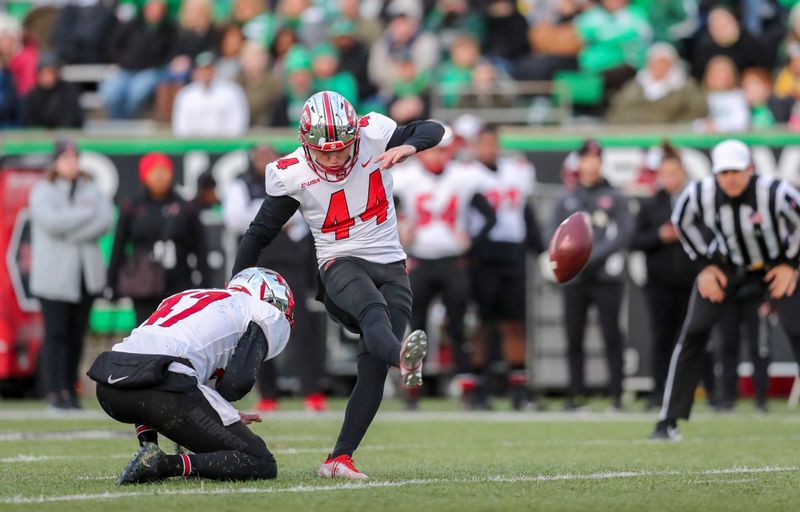 Nov 27, 2021; Huntington, West Virginia, USA; Western Kentucky Hilltoppers place kicker Brayden Narveson (44) kicks a field goal during the second quarter against the Marshall Thundering Herd at Joan C. Edwards Stadium. Mandatory Credit: Ben Queen-USA TODAY Sports