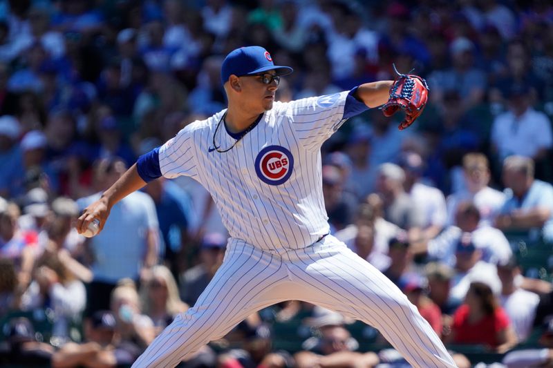 Aug 7, 2024; Chicago, Illinois, USA; Chicago Cubs pitcher Javier Assad (72) throws against the Minnesota Twins during the first inning at Wrigley Field. Mandatory Credit: David Banks-USA TODAY Sports