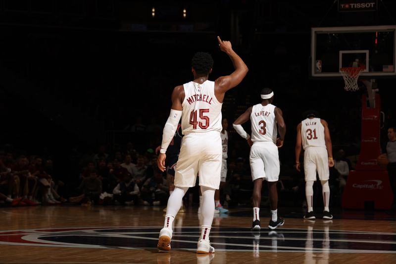 WASHINGTON, DC -? FEBRUARY 7: Donovan Mitchell #45, Caris LeVert #3 and Jarrett Allen #31 of the Cleveland Cavaliers look on during the game against the Washington Wizards on February 7, 2024 at Capital One Arena in Washington, DC. NOTE TO USER: User expressly acknowledges and agrees that, by downloading and or using this Photograph, user is consenting to the terms and conditions of the Getty Images License Agreement. Mandatory Copyright Notice: Copyright 2024 NBAE (Photo by Stephen Gosling/NBAE via Getty Images)