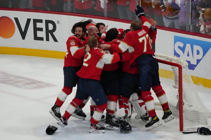 Jun 24, 2024; Sunrise, Florida, USA; Florida Panthers celebrate winning against the Edmonton Oilers in game seven of the 2024 Stanley Cup Final at Amerant Bank Arena. Mandatory Credit: Jim Rassol-USA TODAY Sports