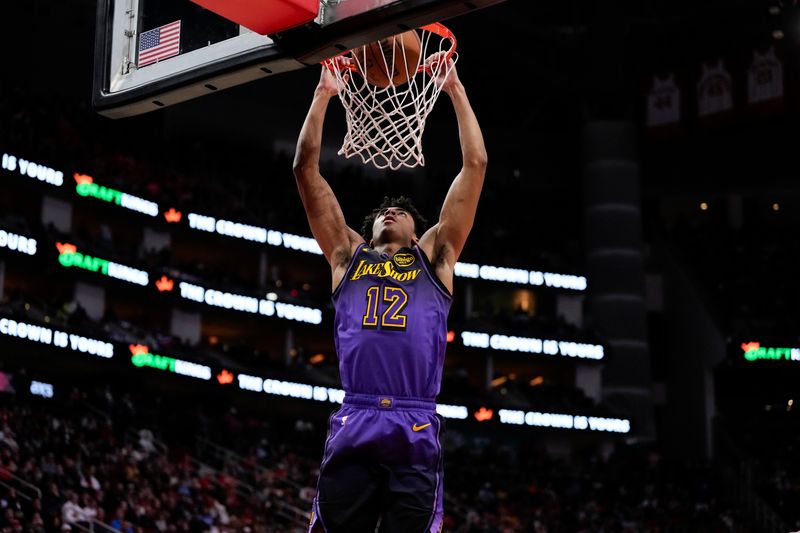 HOUSTON, TX - JANUARY 5:  Max Christie #12 of the Los Angeles Lakers dunks the ball during the game against the Houston Rockets on January 5, 2025 at the Toyota Center in Houston, Texas. NOTE TO USER: User expressly acknowledges and agrees that, by downloading and or using this photograph, User is consenting to the terms and conditions of the Getty Images License Agreement. Mandatory Copyright Notice: Copyright 2025 NBAE (Photo by Kevin M.Cox/NBAE via Getty Images)