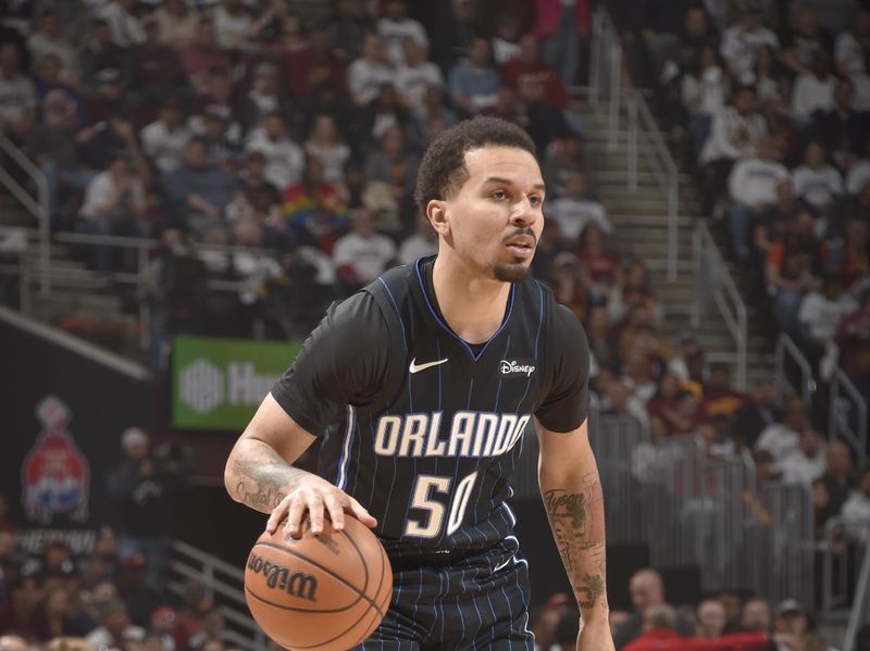 CLEVELAND, OH - APRIL 22: Cole Anthony #50 of the Orlando Magic dribbles the ball during the game against the Cleveland Cavaliers during Round 1 Game 2 of the 2024 NBA Playoffs on April 22, 2024 at Rocket Mortgage FieldHouse in Cleveland, Ohio. NOTE TO USER: User expressly acknowledges and agrees that, by downloading and/or using this Photograph, user is consenting to the terms and conditions of the Getty Images License Agreement. Mandatory Copyright Notice: Copyright 2024 NBAE (Photo by David Liam Kyle/NBAE via Getty Images)