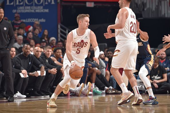 CLEVELAND, OH - December 21: Sam Merrill #5 of the Cleveland Cavaliers dribbles the ball during the game against the New Orleans Pelicans on December 21, 2023 at Rocket Mortgage FieldHouse in Cleveland, Ohio. NOTE TO USER: User expressly acknowledges and agrees that, by downloading and/or using this Photograph, user is consenting to the terms and conditions of the Getty Images License Agreement. Mandatory Copyright Notice: Copyright 2023 NBAE (Photo by David Liam Kyle/NBAE via Getty Images)