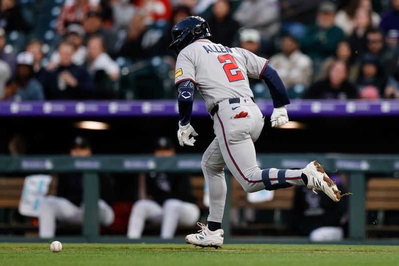 Apr 28, 2025; Denver, Colorado, USA; Atlanta Braves shortstop Nick Allen (2) out runs the ball to first on an RBI single in the fourth inning against the Colorado Rockies at Coors Field. Mandatory Credit: Isaiah J. Downing-Imagn Images