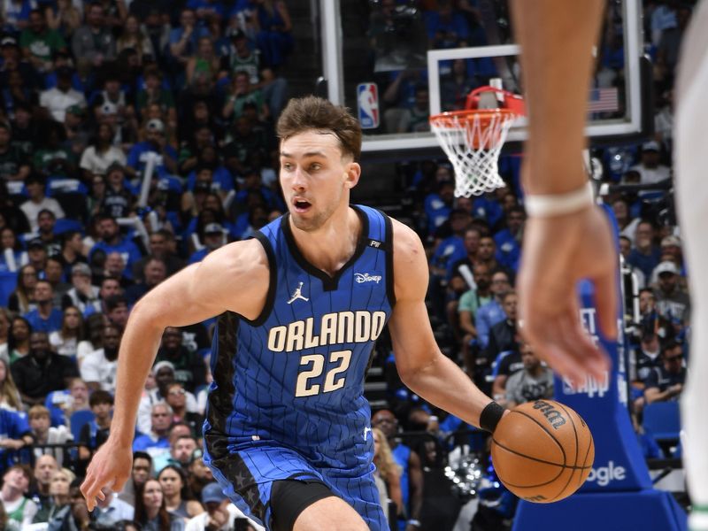 ORLANDO, FL - APRIL 25: Franz Wagner #22 of the Orlando Magic dribbles the ball during Round One, Game Three of the 2025 NBA Playoffs against the Boston Celtics on April 25, 2025 at Kia Center in Orlando, Florida. NOTE TO USER: User expressly acknowledges and agrees that, by downloading and or using this photograph, User is consenting to the terms and conditions of the Getty Images License Agreement. Mandatory Copyright Notice: Copyright 2025 NBAE (Photo by Fernando Medina/NBAE via Getty Images)
