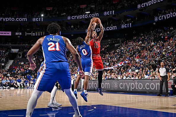 PHILADELPHIA, PA - DECEMBER 18: DeMar DeRozan #11 of the Chicago Bulls shoots the ball during the game against the Philadelphia 76ers on December 18, 2023 at the Wells Fargo Center in Philadelphia, Pennsylvania NOTE TO USER: User expressly acknowledges and agrees that, by downloading and/or using this Photograph, user is consenting to the terms and conditions of the Getty Images License Agreement. Mandatory Copyright Notice: Copyright 2023 NBAE (Photo by David Dow/NBAE via Getty Images)