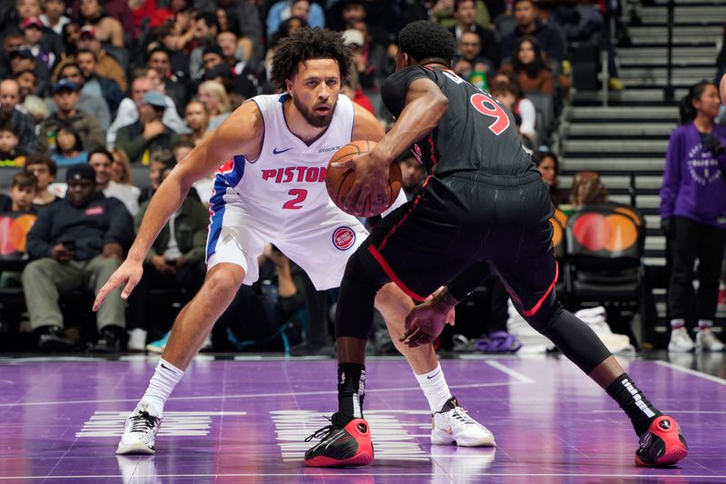 TORONTO, CANADA - NOVEMBER 15: Cade Cunningham #2 of the Detroit Pistons plays defense during the game against the Toronto Raptors during the Emirates NBA CUP game  on November 15, 2024 at the Scotiabank Arena in Toronto, Ontario, Canada.  NOTE TO USER: User expressly acknowledges and agrees that, by downloading and or using this Photograph, user is consenting to the terms and conditions of the Getty Images License Agreement.  Mandatory Copyright Notice: Copyright 2024 NBAE (Photo by Mark Blinch/NBAE via Getty Images)