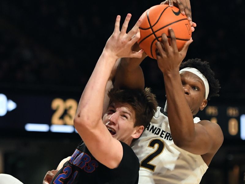 Mar 9, 2024; Nashville, Tennessee, USA; Vanderbilt Commodores forward Ven-Allen Lubin (2) and Florida Gators forward Alex Condon (21) work for a rebound during the first half at Memorial Gymnasium. Mandatory Credit: Christopher Hanewinckel-USA TODAY Sports