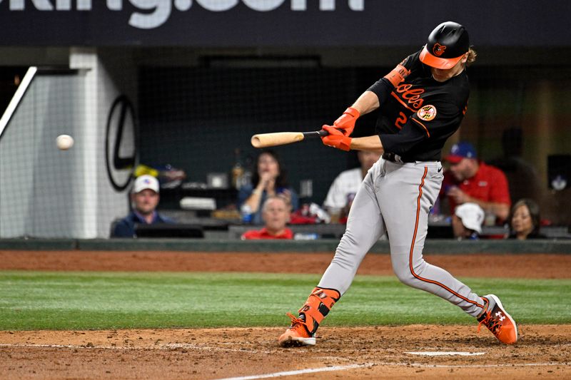 Oct 10, 2023; Arlington, Texas, USA; Baltimore Orioles third baseman Gunnar Henderson (2) hits an RBI single against the Texas Rangers in the fifth inning during game three of the ALDS for the 2023 MLB playoffs at Globe Life Field. Mandatory Credit: Jerome Miron-USA TODAY Sports