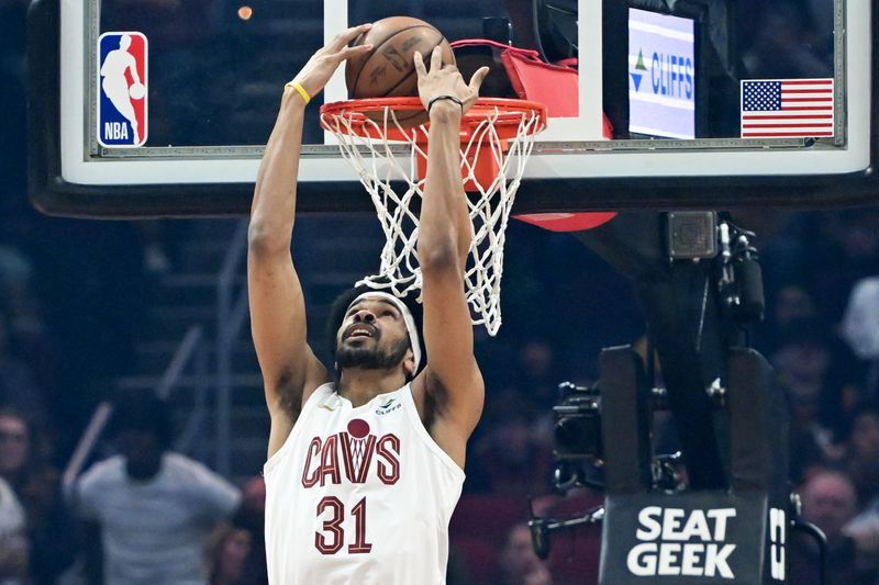 CLEVELAND, OHIO - MARCH 11: Jarrett Allen #31 of the Cleveland Cavaliers dunks during the first half against the Phoenix Suns at Rocket Mortgage Fieldhouse on March 11, 2024 in Cleveland, Ohio. NOTE TO USER: User expressly acknowledges and agrees that, by downloading and or using this photograph, User is consenting to the terms and conditions of the Getty Images License Agreement. (Photo by Nick Cammett/Getty Images)