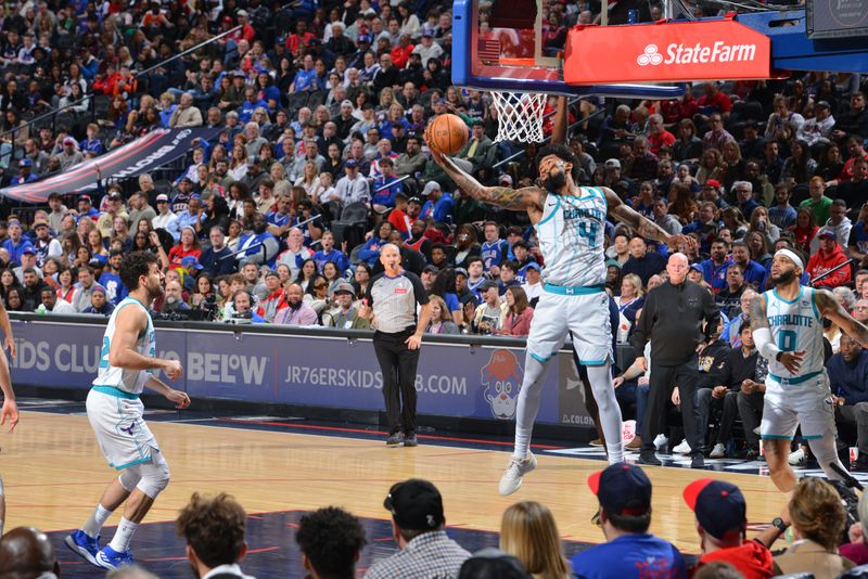 PHILADELPHIA, PA - MARCH 16: Nick Richards #4 of the Charlotte Hornets rebounds the ball during the game against the Philadelphia 76ers on March 16, 2024 at the Wells Fargo Center in Philadelphia, Pennsylvania NOTE TO USER: User expressly acknowledges and agrees that, by downloading and/or using this Photograph, user is consenting to the terms and conditions of the Getty Images License Agreement. Mandatory Copyright Notice: Copyright 2024 NBAE (Photo by Jesse D. Garrabrant/NBAE via Getty Images)