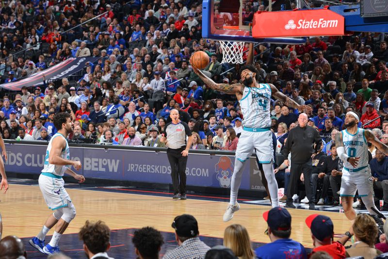 PHILADELPHIA, PA - MARCH 16: Nick Richards #4 of the Charlotte Hornets rebounds the ball during the game against the Philadelphia 76ers on March 16, 2024 at the Wells Fargo Center in Philadelphia, Pennsylvania NOTE TO USER: User expressly acknowledges and agrees that, by downloading and/or using this Photograph, user is consenting to the terms and conditions of the Getty Images License Agreement. Mandatory Copyright Notice: Copyright 2024 NBAE (Photo by Jesse D. Garrabrant/NBAE via Getty Images)